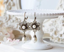 Load image into Gallery viewer, Bridal Earrings, Vintage Style Wedding Earrings, Cream White Pearls Dangle Earrings, Antiqued Brass Filigree Flowers Leaverback Earrings
