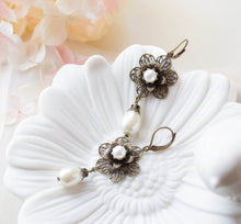 Load image into Gallery viewer, Bridal Earrings, Vintage Style Wedding Earrings, Cream White Pearls Dangle Earrings, Antiqued Brass Filigree Flowers Leaverback Earrings
