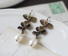 Load image into Gallery viewer, Brass Orchid  Earrings. Cream White Teardrop Pearls Orchid Flower Earrings.Vintage Themed Wedding Earrings. Bridal Jewelry Bridesmaid Gift
