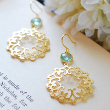 Load image into Gallery viewer, Gold Circle filigree pendant earrings with aquamarine blue crystals
