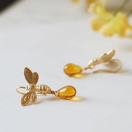 gold bee and honey drop earrings