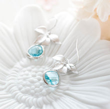 Load image into Gallery viewer, Silver Orchid Flower Aquamarine Blue Crystal Earrings
