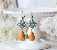 Load image into Gallery viewer, Verdigris Filigree Dangle Earrings, Orange Etched Lucite Bead Drop Earrings, Blue Patina Brass Filigree, Boho Chic, Bohemian Earrings
