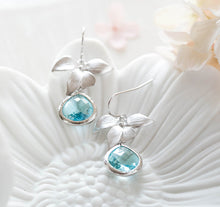 Load image into Gallery viewer, Silver Orchid Flower Aquamarine Blue Crystal Earrings
