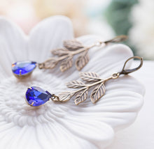 Load image into Gallery viewer, Brass Leaf Earrings Sapphire Blue Rhinestone Crystals Earrings, Woodland Garden Wedding Bridal Earrings, September Birthstone Jewelry
