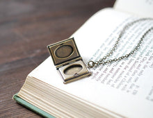 Load image into Gallery viewer, Book Locket Necklace. Antique Brass Book Locket with Ivory Cream Resin Rose, Miniature Book Necklace, Gift for Librarian, Christmas Gift
