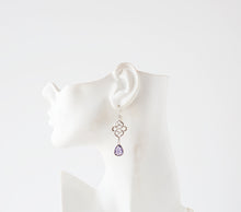 Load image into Gallery viewer, Silver Celtic Knot Earrings with Purple Crystals
