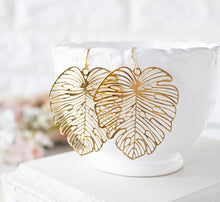 Load image into Gallery viewer, Gold Monstera Earrings, Large Leaf Earrings, Statement Earrings, Boho Bohemian Earrings, Botanical Woodland Jewelry, Gift for Women for her
