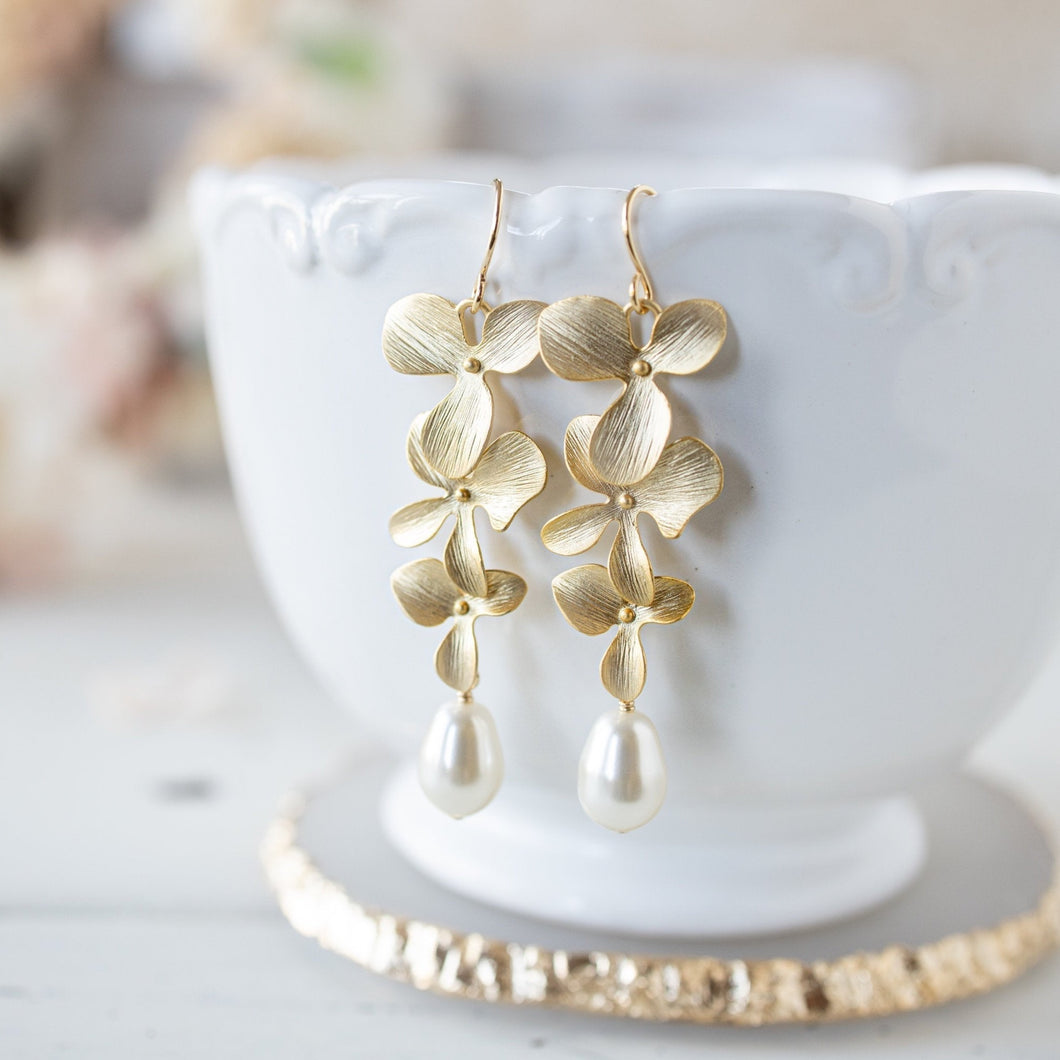 cascading gold flowers white teardrop pearls earrings