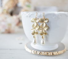 Load image into Gallery viewer, Cream Teardrop Pearl Bridal Earrings, Ivory Pearl Earrings, Gold Cascading Orchid Flower Earrings, White Pearl Wedding Earrings
