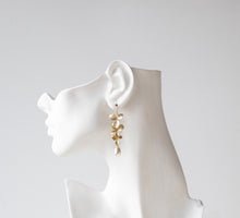 Load image into Gallery viewer, Matte Gold Flowers Cream White Teardrop Pearls Earrings. Bridal Earrings.
