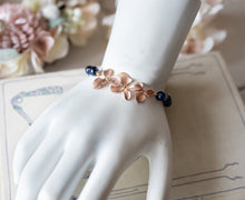 Load image into Gallery viewer, Rose Gold Navy Blue Pearls Adjustable Bracelet, Rose Gold Flower Bracelet, Dark Blue Pearls, Navy Blue Wedding Jewelry, Bridesmaid Gift
