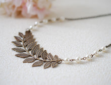 Load image into Gallery viewer, Large Leaf  Branch Necklace. Antiqued Brass Leaf Cream Ivory Pearls Necklace. Leaf Choker, Bridal jewelry, Woodland Jewelry, wedding
