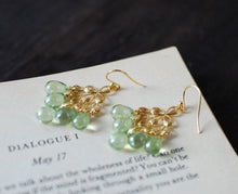 Load image into Gallery viewer, Mint Green Glass Drops Chandelier Earrings. Mint Green Czech Glass Drops, Gold Peacock Feather Chandelier Earrings. Summer Accessory
