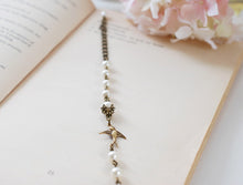 Load image into Gallery viewer, Swallow Bird Cream Ivory Pearls Bracelet. Swarovski Cream Pearls, Antique Brass Bird, Vintage Style Bridal Bracelet, Bridesmaids Gift
