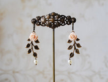 Load image into Gallery viewer, Leaf Earrings. Peach Pink Flower Antiqued Brass Leaf Branch Swarovski Cream Pearl Dangle Earrings, Woodland Wedding Bridal Jewelry
