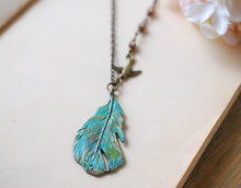 Load image into Gallery viewer, Feather Necklace. Teal Blue Verdigris Patina Feather Brass Swallow Bird Purple Brown Glass Beads Necklace, Bohemian Boho Woodland Jewelry
