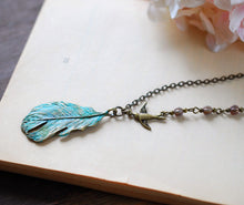 Load image into Gallery viewer, Feather Necklace. Teal Blue Verdigris Patina Feather Brass Swallow Bird Purple Brown Glass Beads Necklace, Bohemian Boho Woodland Jewelry
