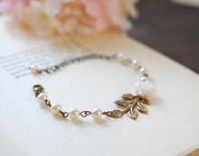 Load image into Gallery viewer, Bridal Bracelet, Wedding Bracelet, Flower Girl Bracelet. White Flower Cream Ivory Pearls Antiqued Brass Leaf Bracelet, Bridesmaid Bracelets
