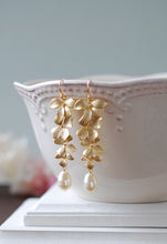 Load image into Gallery viewer, Silver Cascading Orchid Flowers Cream Teardrop Pearls Earrings. Bridal Earrings
