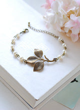 Load image into Gallery viewer, Leaf Bracelet Antiqued Brass Leaf Sprig White Cream Pearls Adjustable Bracelet Woodland Wedding Jewelry Bridal Bracelet mothers day gift
