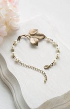 Load image into Gallery viewer, Leaf Bracelet Antiqued Brass Leaf Sprig White Cream Pearls Adjustable Bracelet Woodland Wedding Jewelry Bridal Bracelet mothers day gift
