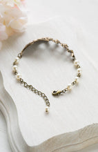 Load image into Gallery viewer, Lily of the Valley Bracelet Cream White Pearls Antiqued Brass Flower Bracelet Vintage Wedding Bridal Bracelet lily of the valley jewelry
